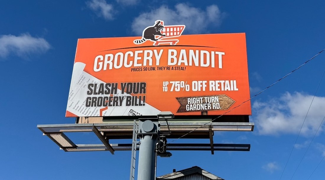 Orange billboard advertising grocery bandit store